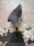 Purple amethyst on stand