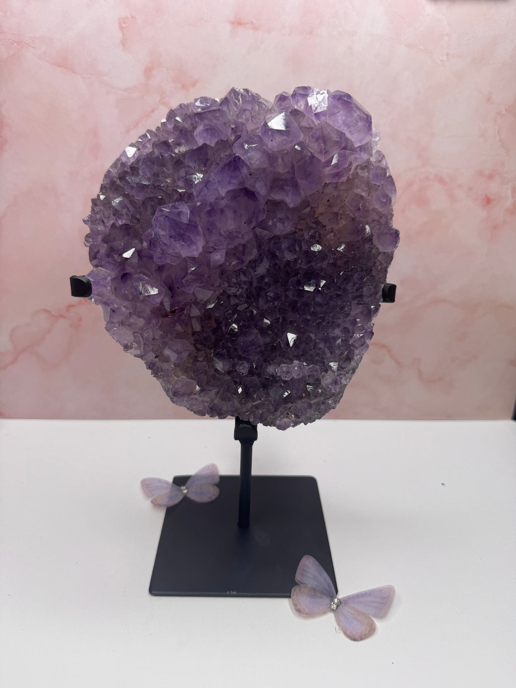 Purple amethyst on stand