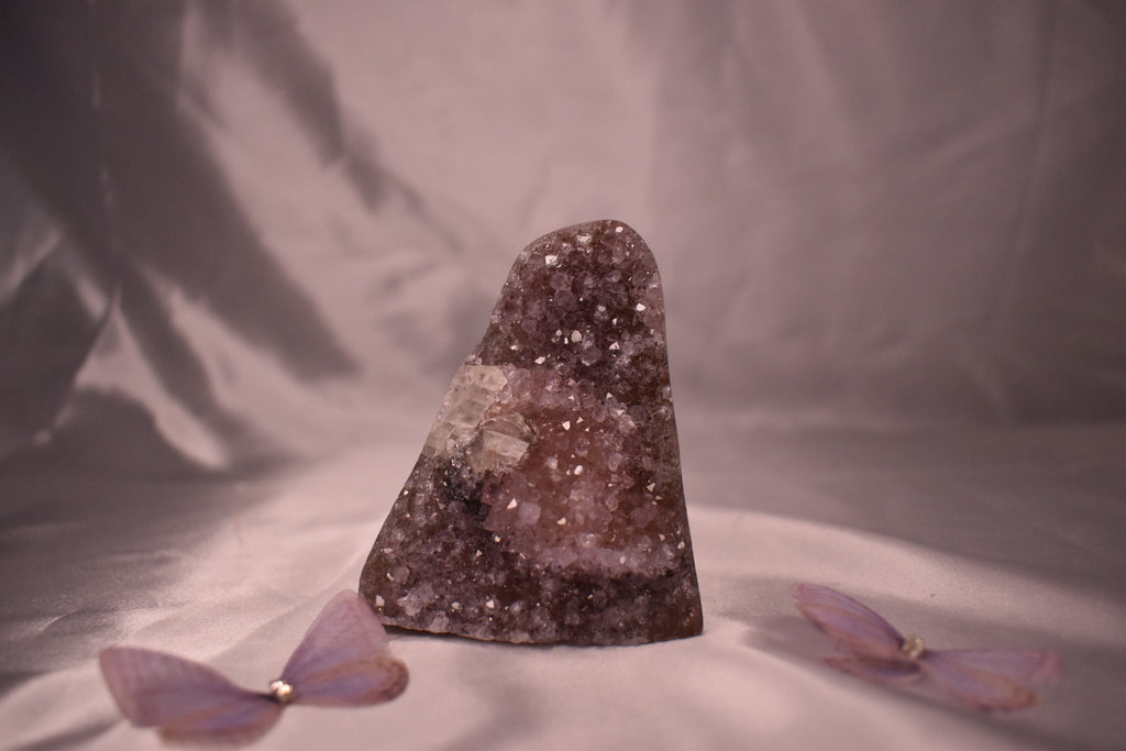 Purple amethyst cut base with calcite
