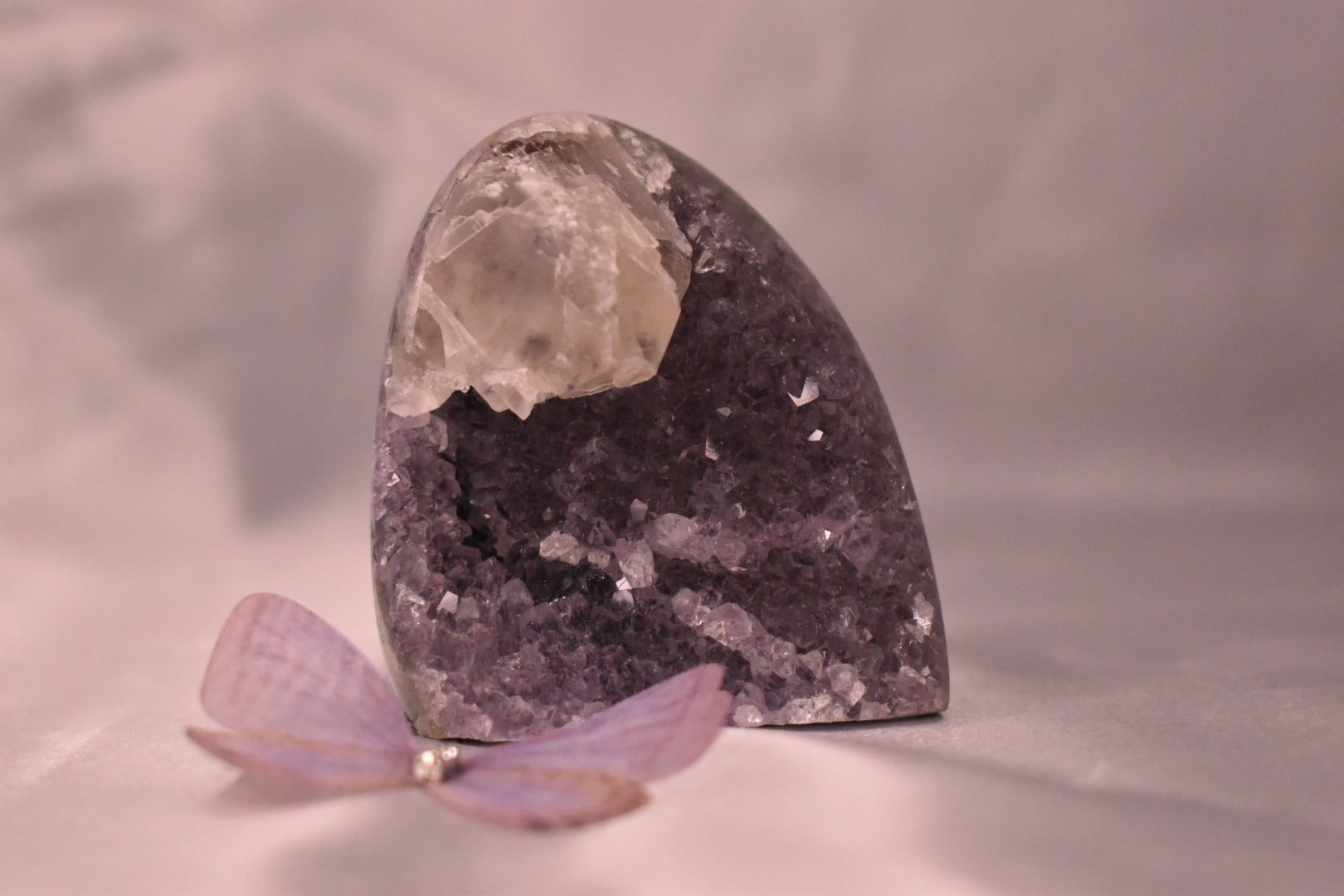 Purple amethyst cut base with calcite
