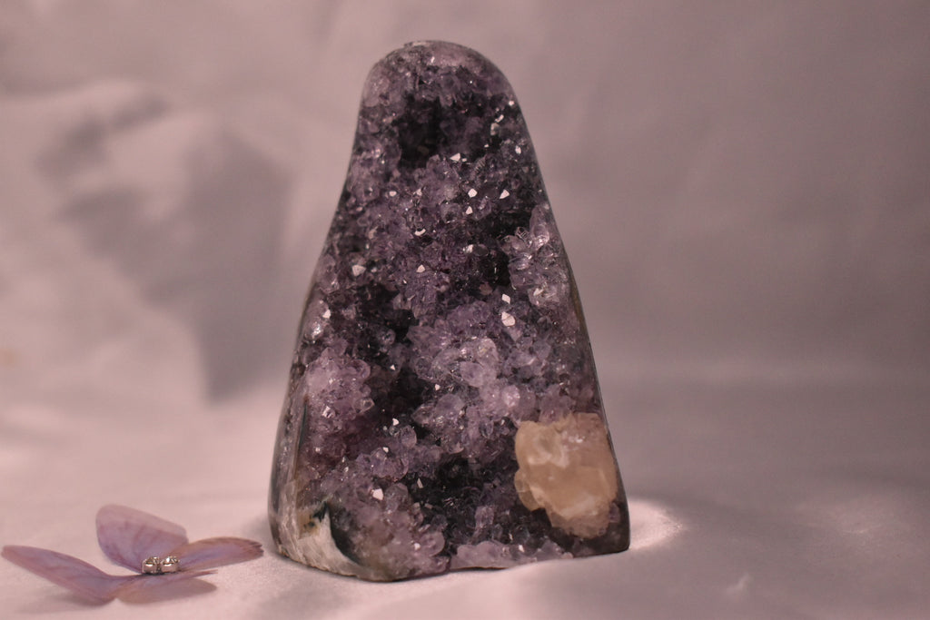 Purple amethyst cut base with calcite