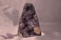 Purple amethyst cut base with calcite