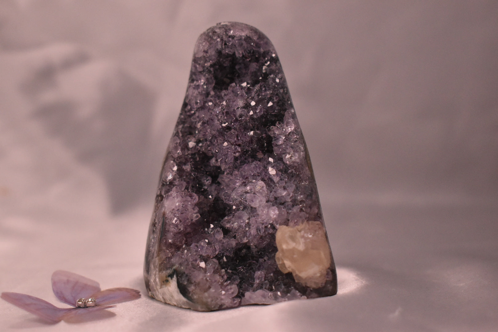 Purple amethyst cut base with calcite