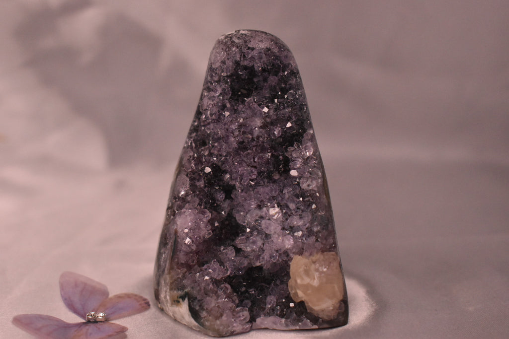 Purple amethyst cut base with calcite