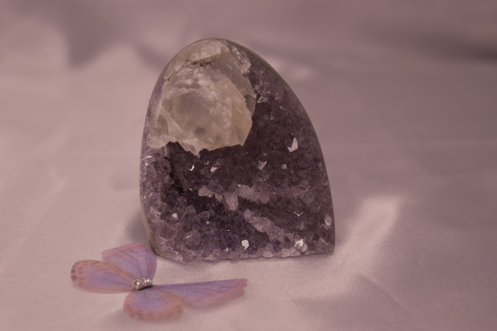 Purple amethyst cut base with calcite