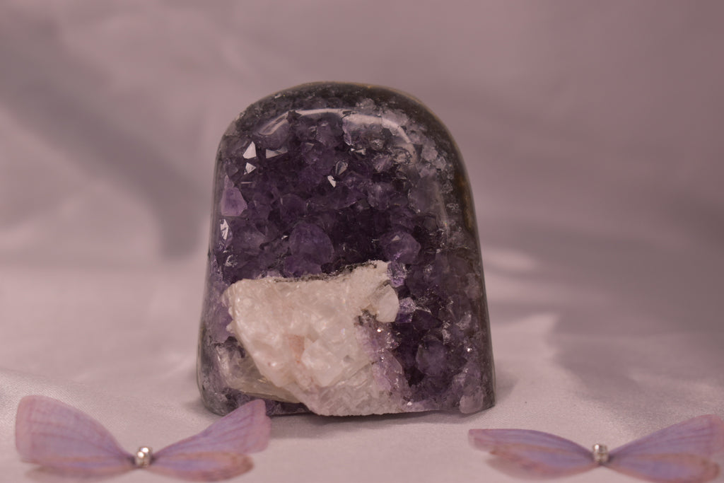 Purple amethyst cut base with calcite￼
