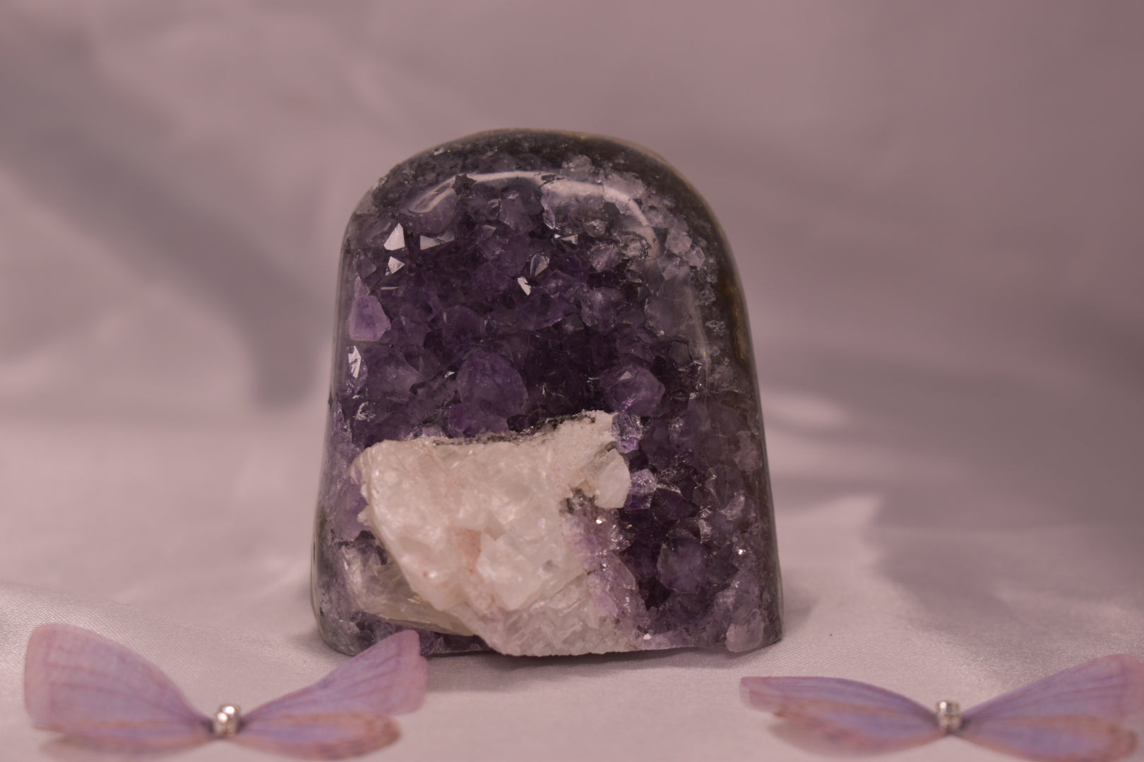 Purple amethyst cut base with calcite￼