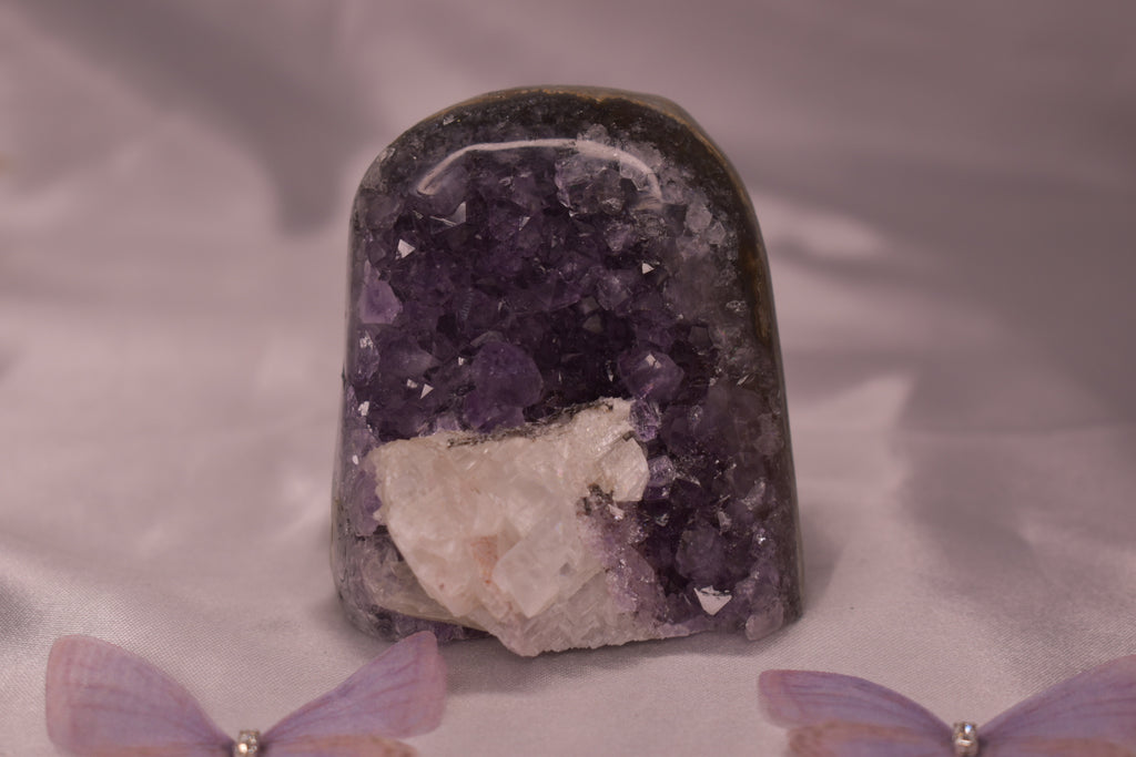 Purple amethyst cut base with calcite￼