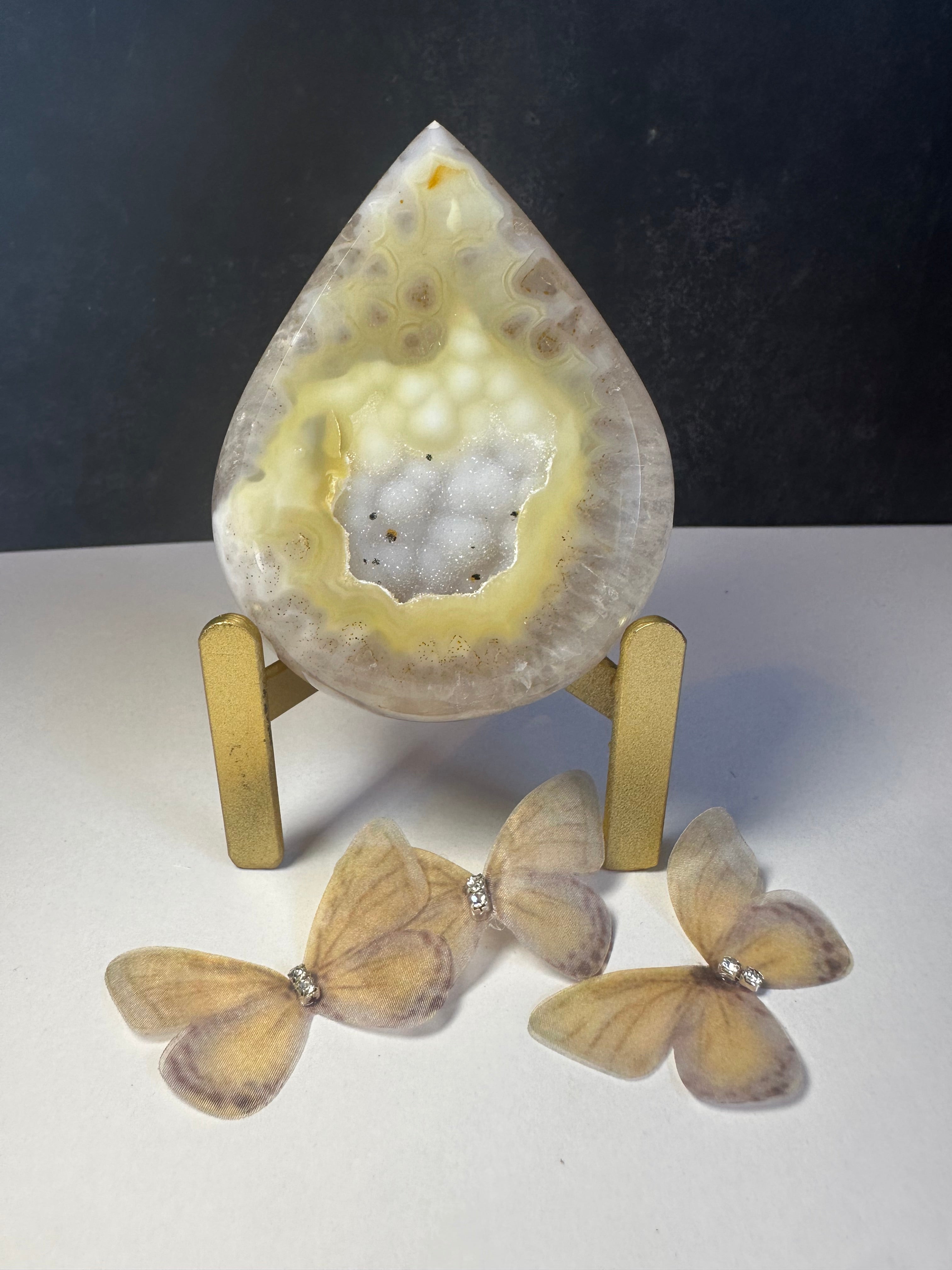 Gold agate tear drop on stand