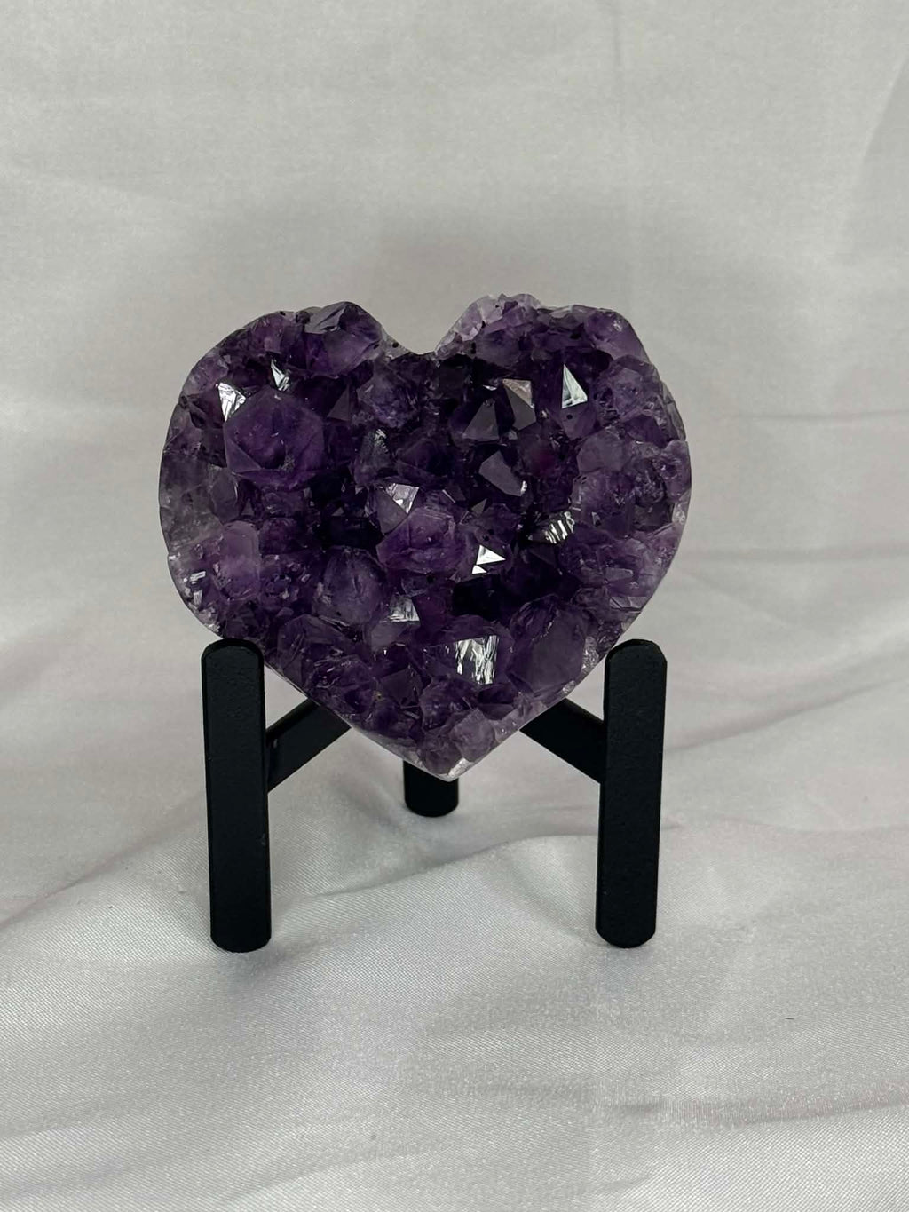 Purple amethyst heart on stand