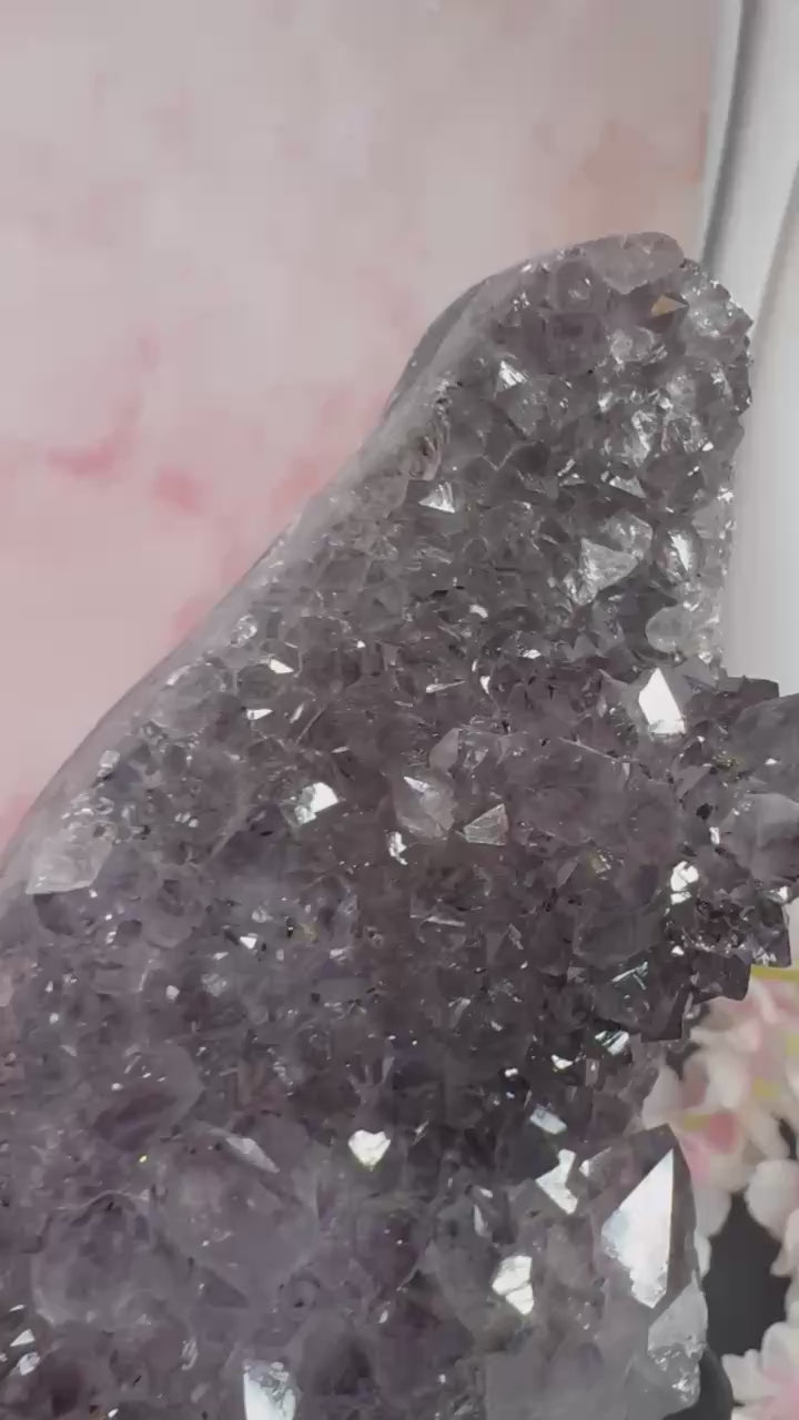 Purple amethyst on stand