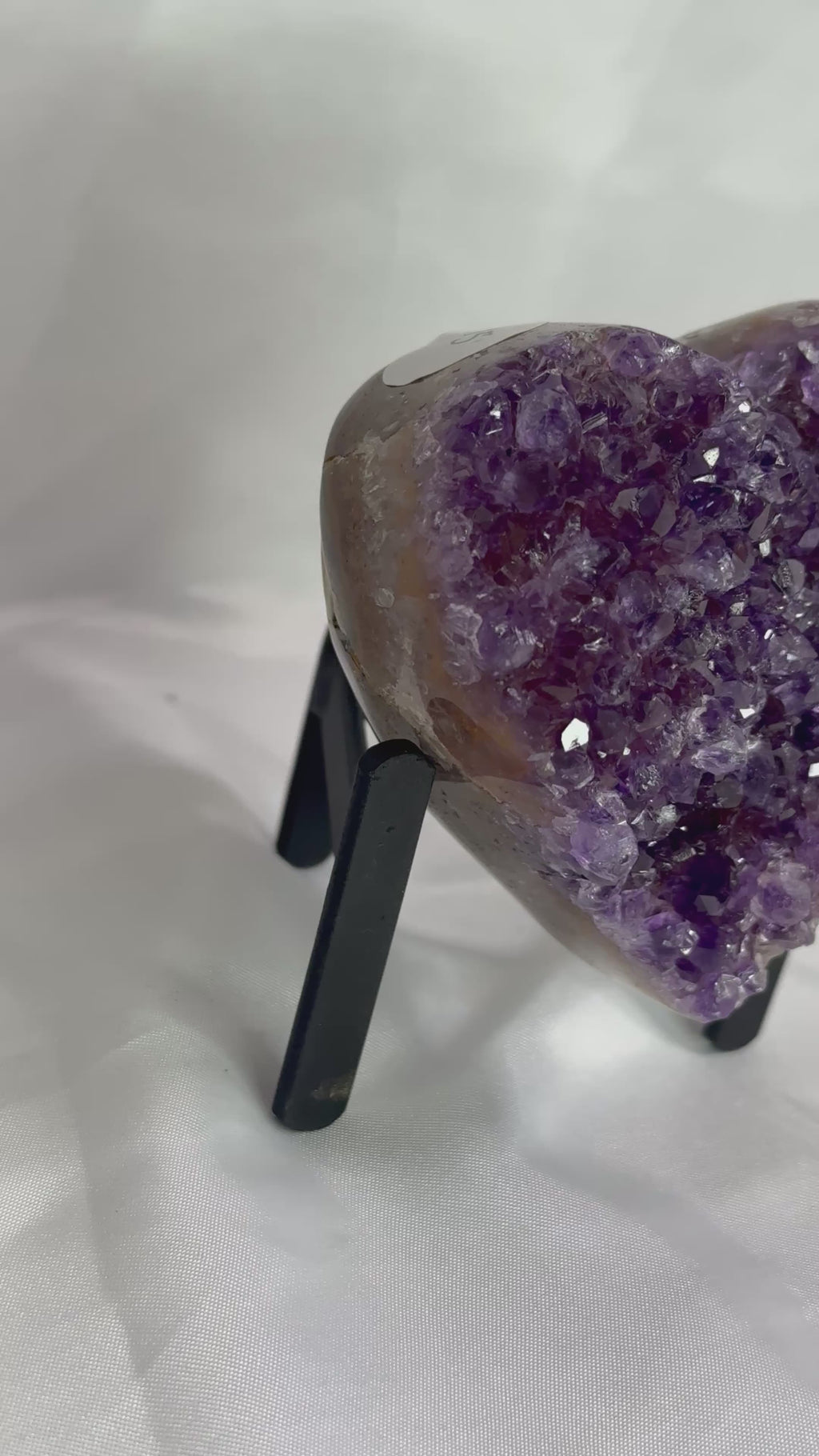 Purple amethyst heart on stand