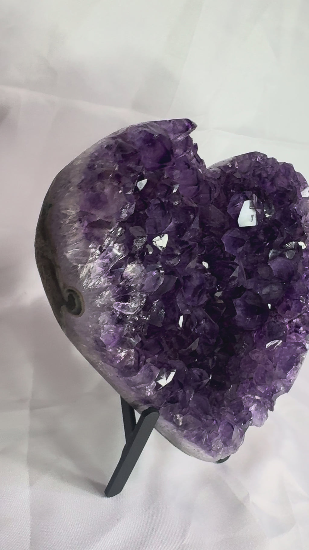 Purple amethyst heart on stand