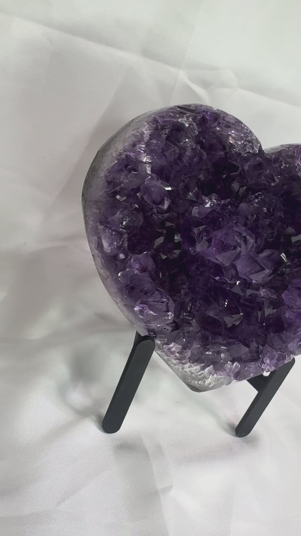 Purple amethyst heart on stand